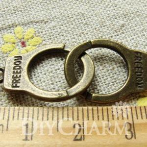 Antique Bronze Freedom Handcuff Charms Double..