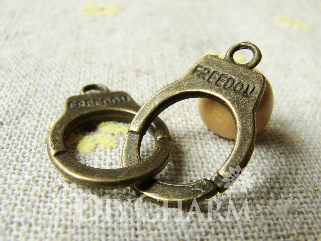 Antique Bronze Freedom Handcuff Charms Double Sided 20x15mm - 10pcs - Dc22633